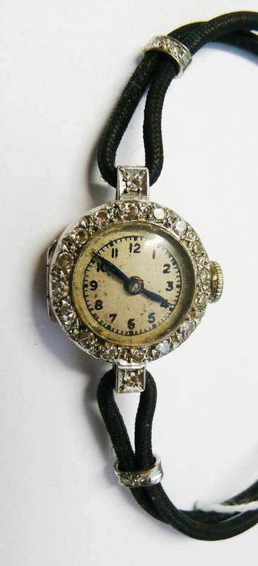 Lot 39 - A Lady's Art Deco Diamond Set Wristwatch, lever movement, silvered dial with Arabic numerals,...