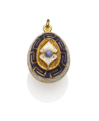 Lot 50 - An Enamelled Egg Pendant, the egg enamelled in blue and white, and hung from a pendant loop,...