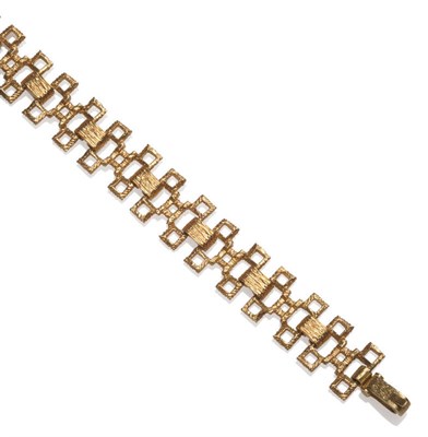 Lot 58 - A Bracelet, of textured geometric links, length 19.5cm, width 1.8cm
