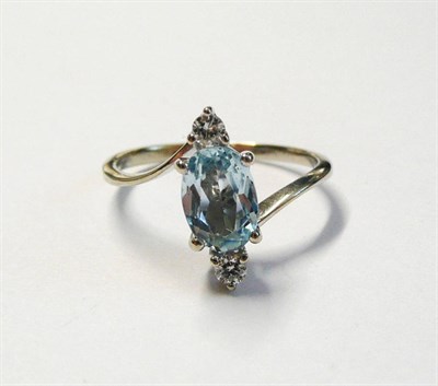 Lot 64 - An Aquamarine Ring, the oval cut aquamarine with a round brilliant cut diamond top and bottom,...