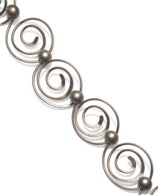 Lot 81 - A Modernist Choker, by Art Smith, scrolling forms, linked by beads, length 39cm, width 4.2cm