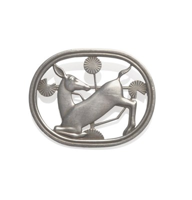 Lot 88 - A Silver Brooch, by Georg Jensen, the oval frame centred by the image of a kneeling deer,...