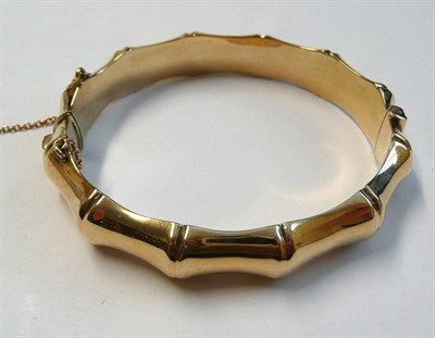 Lot 102 - A 9 Carat Gold Bamboo Link Bangle, of hollow half hinged form