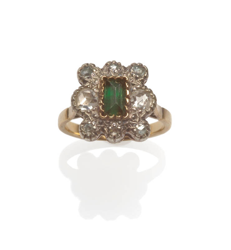 Lot 109 - A Cluster Ring, a step cut green stone within a border of rose cut diamonds, in yellow and...