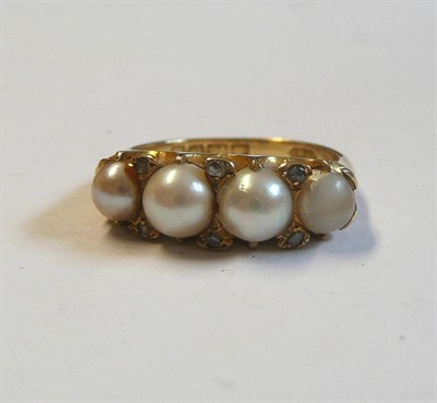 Lot 142 - An Early 20th Century 18 Carat Gold Cultured Pearl and Diamond Ring, the assorted pearls spaced...