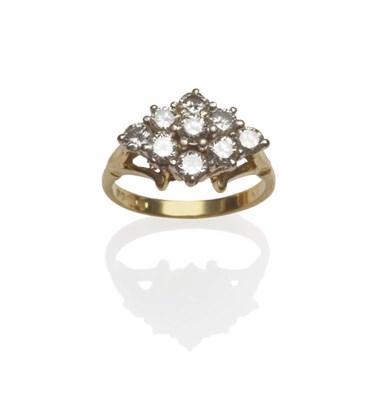 Lot 147 - An 18 Carat Gold Cluster Ring, nine round brilliant cut diamonds in white claw settings, to...