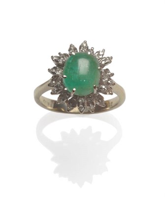 Lot 152 - An Emerald and Diamond Cluster Ring, an oval cabochon emerald in a white six claw setting, within a