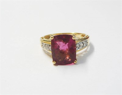 Lot 190 - A 14 Carat Gold Pink Tourmaline Ring, the pineapple cut cushion shaped pink tourmaline in a...