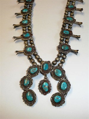 Lot 197 - An American-Indian Necklace, a double row of white metal beads, with turquoise inset panel...
