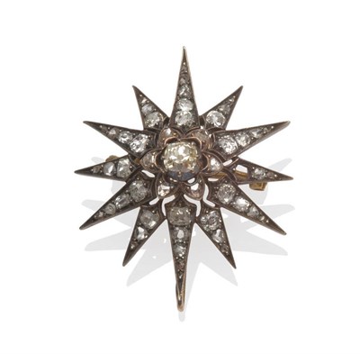 Lot 199 - A Victorian Diamond Set Star Brooch, the old cut diamonds arranged as a cluster centrally...