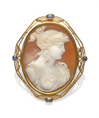 Lot 201 - A Shell Cameo Brooch, carved with a classical maiden, within a Art Nouveau style frame, with...