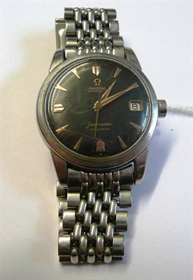 Lot 215 - A Stainless Steel Automatic Calendar Centre Seconds Wristwatch, signed Omega, model: Seamaster...
