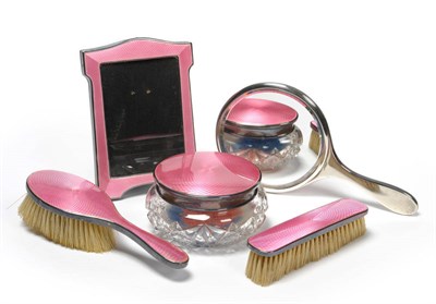 Lot 238 - A Matched Silver and Pink Enamel Five Piece Dressing Table Set, various dates and makers,...
