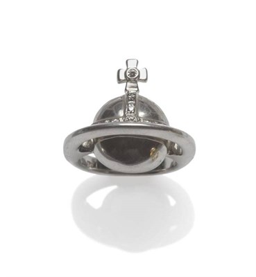 Lot 1009 - A Ring, by Vivienne Westwood, depicting the orb surmounted by a cross logo, inset with diamonds, on