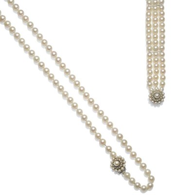 Lot 1061 - A Cultured Pearl Necklace, eighty uniform pearls knotted to a 9 carat white gold clasp, set...