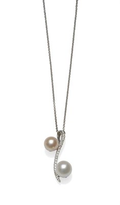 Lot 1087 - An 18 Carat White Gold Cultured Pearl and Diamond Pendant on Chain, the contemporary pendant of...