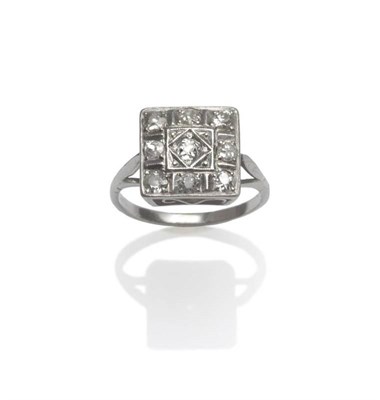 Lot 1089 - An Art Deco Diamond Ring, nine old cut diamonds in white claw and millegrain settings, in a...