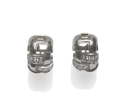 Lot 1098 - A Pair of 18 Carat White Gold Diamond Set Earrings, by Tiffany & Co., the cuff forms with...