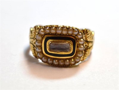 Lot 1110 - An 18 Carat Gold Pearl Set Mourning Ring, the plaque front with a locket panel centrally, enclosing