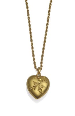 Lot 1112 - An Heart Shaped Pendant on Chain, the heart with floral motif overlaid to the front, on a rope...