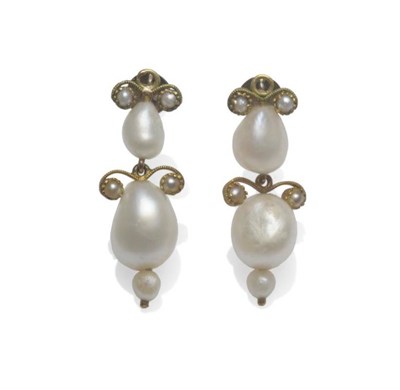 Lot 1120 - A Pair of Pearl Drop Earrings, each with a duo of irregular shaped pearls, within a scroll...