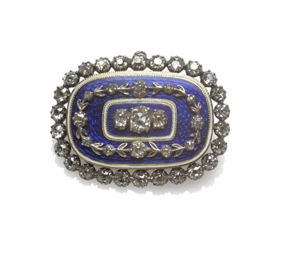 Lot 1121 - A Victorian Diamond and Enamelled Brooch, of oval form, three old cut diamonds centrally, spaced to