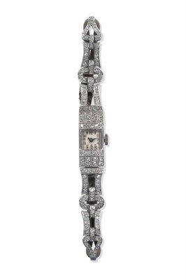 Lot 1136 - An Art Deco Lady's Diamond Set Wristwatch, lever movement, silvered dial with Arabic numerals,...