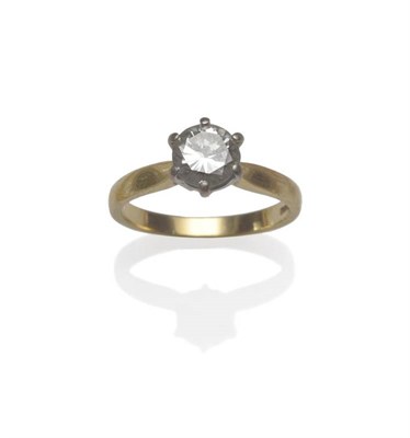 Lot 1145 - An 18 Carat Gold Diamond Solitaire Ring, the round brilliant cut diamond in a white six claw...