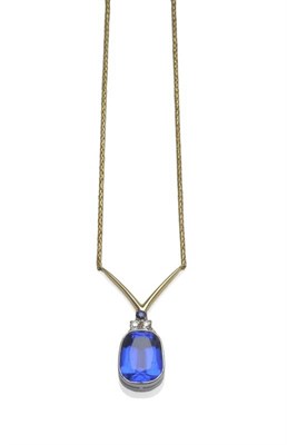 Lot 1147 - An 18 Carat Gold Necklace, a large blue paste in a white rubbed over setting, surmounted by two old