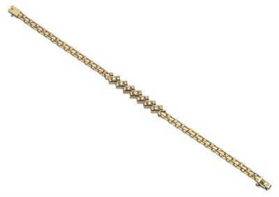 Lot 1166 - A Diamond Set Bracelet, trios of graduated round brilliant cut diamonds in yellow claw settings...