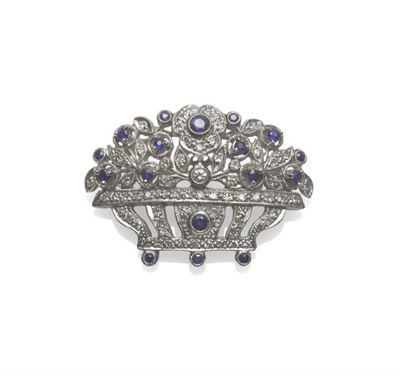 Lot 1179 - A Sapphire and Diamond Brooch, the stones in white claw and millegrain settings arranged as a...