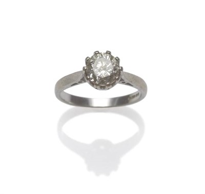 Lot 1183 - An 18 Carat White Gold Diamond Solitaire Ring, the round brilliant cut diamond in a claw...