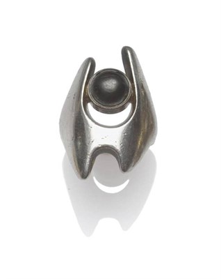 Lot 1213 - A Silver Ring, by Georg Jensen, a cabochon haematite within an asymmetric setting, model number...