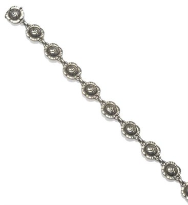 Lot 1219 - A Silver Bracelet, by Georg Jensen, of stylised floral links, model number 44, length 19.5cm