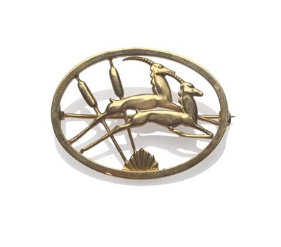 Lot 1221 - A 9 Carat Gold Brooch, by Ivan Tarratt, in the style of Georg Jensen, with two running antelope...