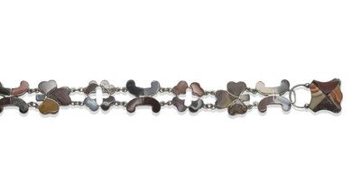 Lot 1223 - A Scottish Agate Set Bracelet, a series of chain linked symbols inset with hardstones including...