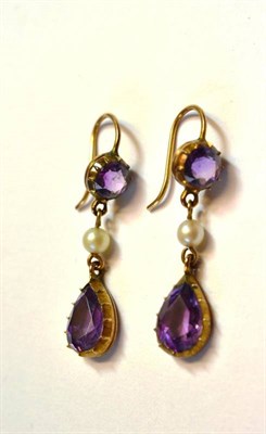 Lot 1227 - A Pair of Amethyst and Seed Pearl Drop Earrings, a round cut amethyst to a seed pearl, and a...