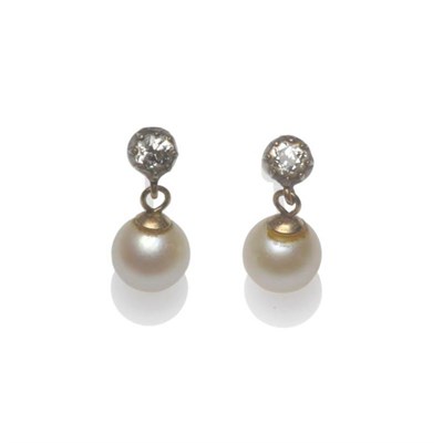 Lot 1235 - A Pair of Diamond and Cultured Pearl Earrings, an old cut diamond suspends a cultured pearl,...