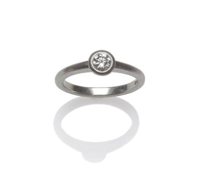 Lot 1236 - A Platinum Diamond Solitaire Ring, by Dower and Hall, the round brilliant cut diamond in a...