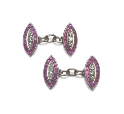 Lot 1239 - A Pair of Diamond and Ruby Cufflinks, each lozenge shaped chain linked head comprises three...