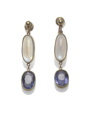 Lot 1240 - A Pair of Moonstone and Sapphire Drop Earrings, a ball stud suspends a long oval cabochon moonstone