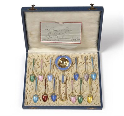 Lot 1249 - A Set of Twelve Norwegian Silver Gilt and Enamel Coffee Spoons with Matching Strainer and...