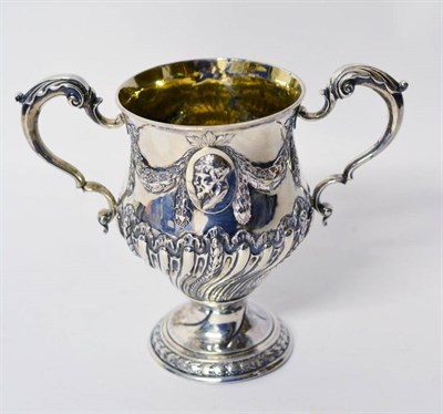 Lot 1261 - A George V Silver Twin-Handled Cup, Hunt & Roskell Ltd, London 1914, on a circular base with...