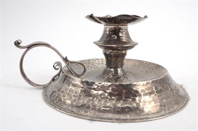 Lot 1263 - An Arts & Crafts Silver Chamber Candlestick, maker's mark W D & Co, Sheffield 1907, beaten...