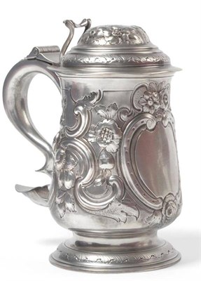 Lot 1279 - A George II Silver Tankard, John Langlands I, Newcastle 1759, the baluster body with later embossed