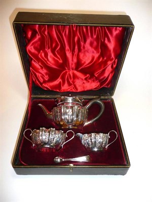 Lot 1299 - A Victorian Silver Three Piece Bachelors Tea Service, various marks, each with shaped sides and...