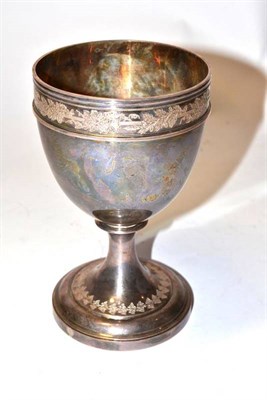 Lot 1306 - A George III Silver Goblet, John Emes, London 1805, with chased foliate border to the rim and foot