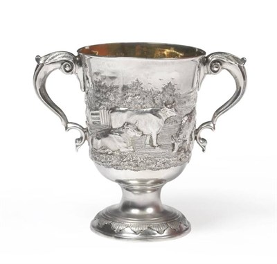 Lot 1318 - A Irish George III Silver Loving Cup, Dublin, the tapering body with extensive Victorian...