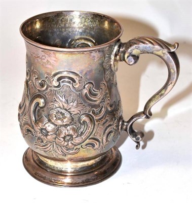 Lot 1321 - A George III Silver Baluster Mug, probably Walter Brind, London 1772, with later embossed...