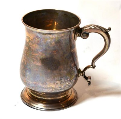 Lot 1323 - A George III Silver Baluster Mug, William & James Priest, London 1772, with a leaf capped...